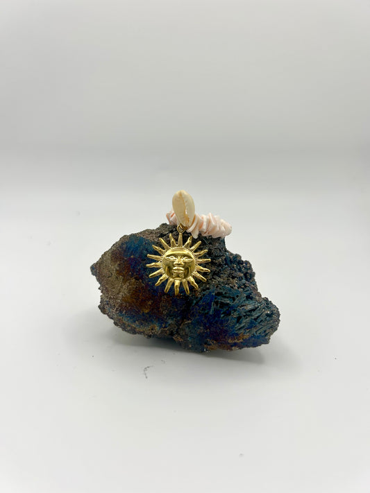 
Bague soleil, caurie et coquillage 